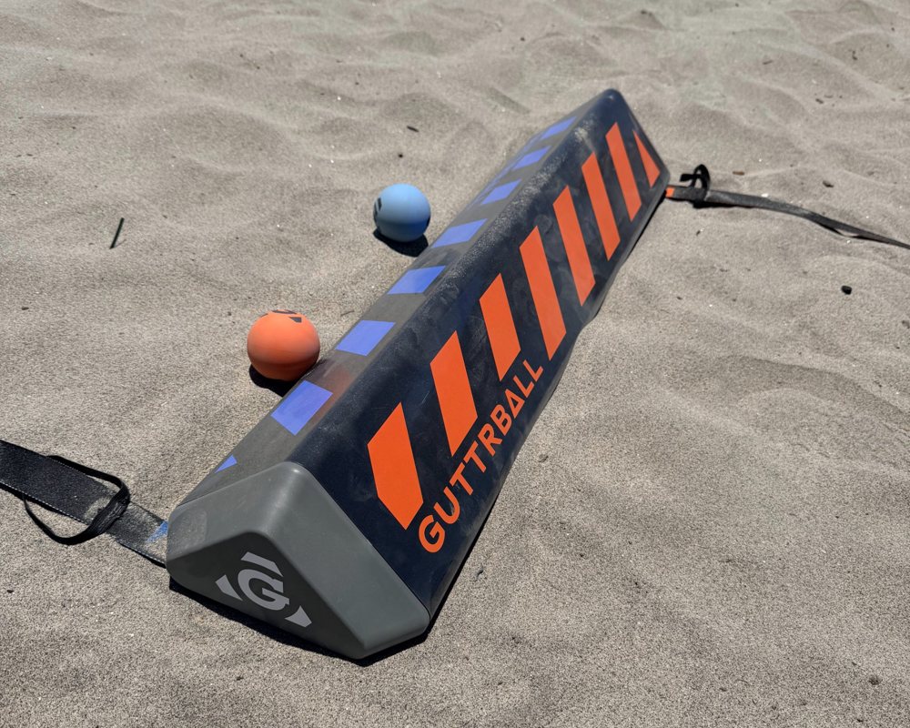 Guttrball and balls on the sand